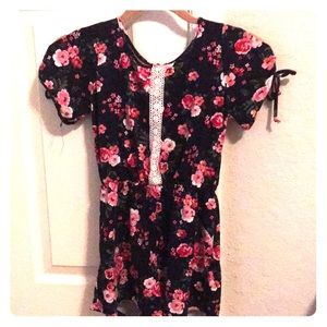 Blue outfit with pretty flowers.